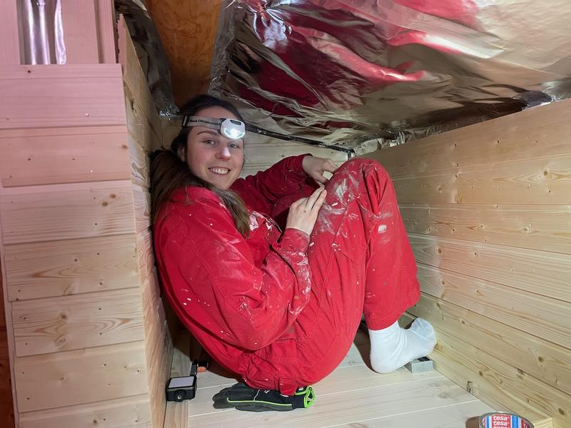 Johanna building the sauna