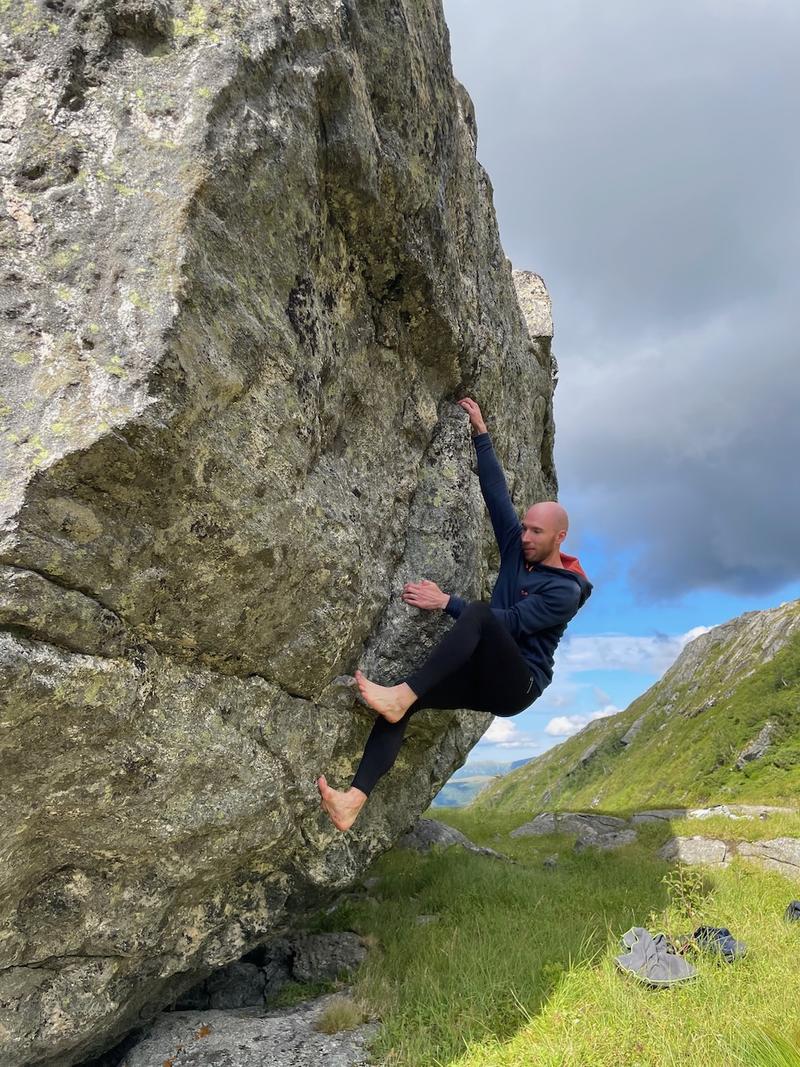 Me bouldering on a big rock in Norway